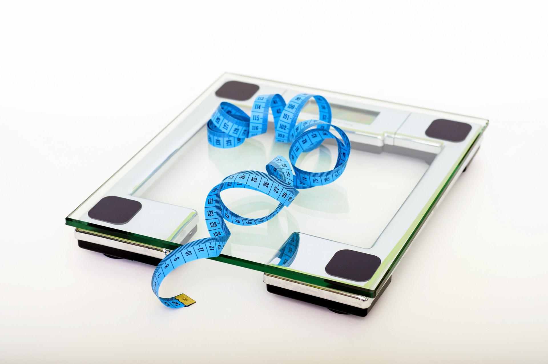 a body weight scale and a tape measure